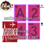 Red Aviator cheating cards with invisible ink marks